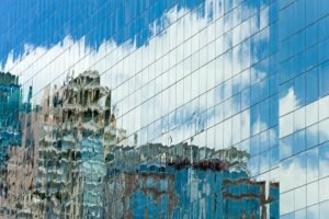 UK LL - building glass reflect city and sky - small